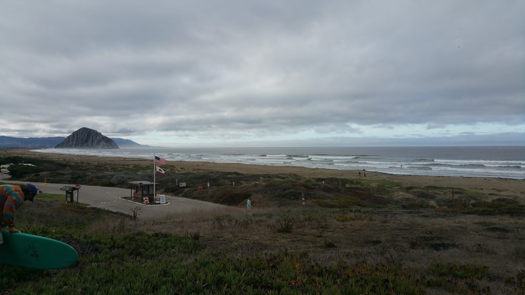 lots of low quality beach break and a big rock in the ocean